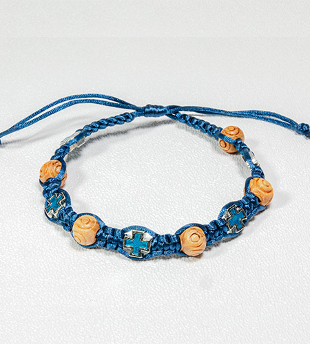 4873424 CARVED WOOD BEAD & CROSS BLUE BRAIDED ROSARY BRACELET